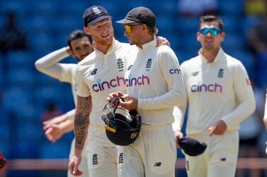 England's Ben Stokes, left, embraces his captain Joe Root after they lost by 10 wickets against West Indies during day four of their third Test cricket match at the National Cricket Stadium in St.  George, Grenada, Sunday, March 27, 2022.  (AP Photo / Ricardo Mazalan)