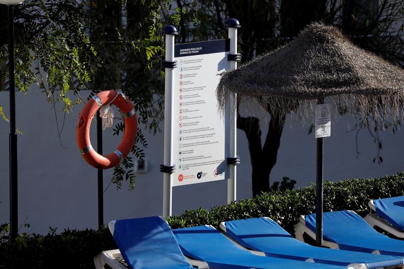 A float is seen at a swimming pool where where three members of the same British family, a father and two children, were found on Christmas Eve at a Costa del Sol resort in Las Lagunas de Mijas, southern Spain December 25, 2019. REUTERS/Jon Nazca