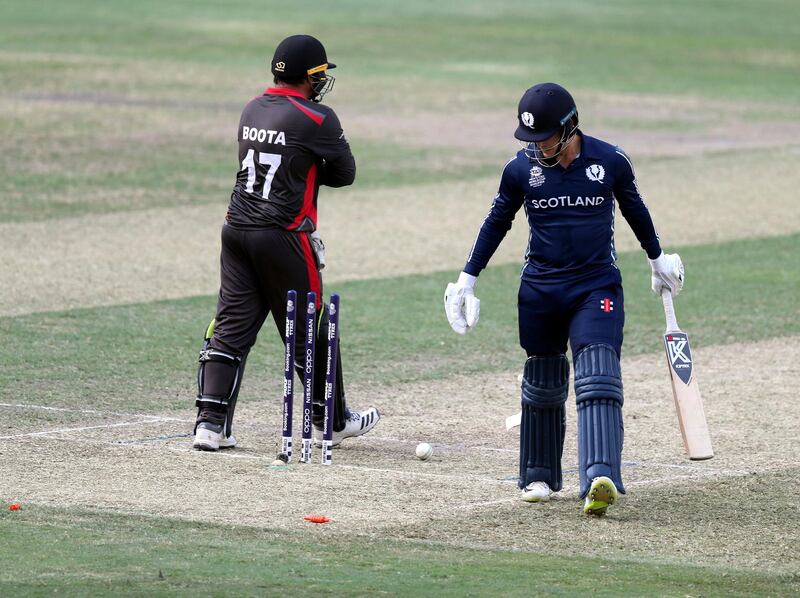 Dubai, United Arab Emirates - October 30, 2019: Tom Sole of Scotland is bowled by the UAE's Rohan Mustafa during the game between the UAE and Scotland in the World Cup Qualifier in the Dubai International Cricket Stadium. Wednesday the 30th of October 2019. Sports City, Dubai. Chris Whiteoak / The National