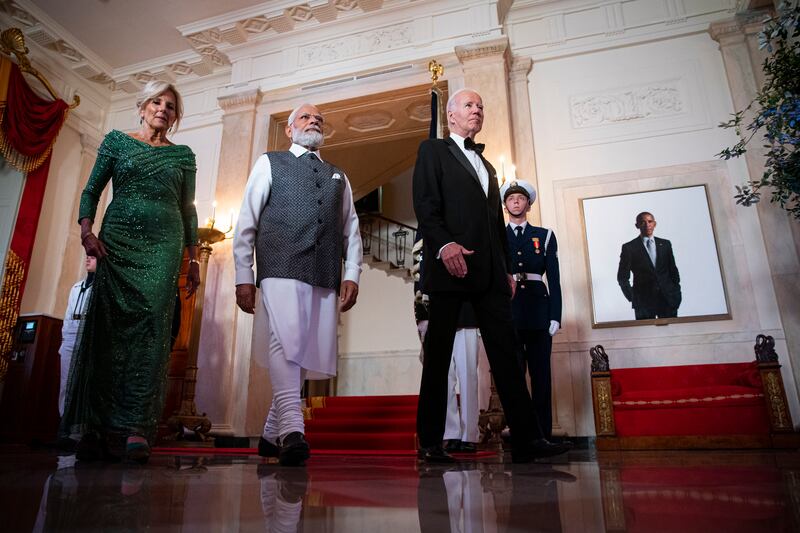 Mr Biden, Mr Modi and first lady Jill Biden at the Grand Staircase of the White House. EPA