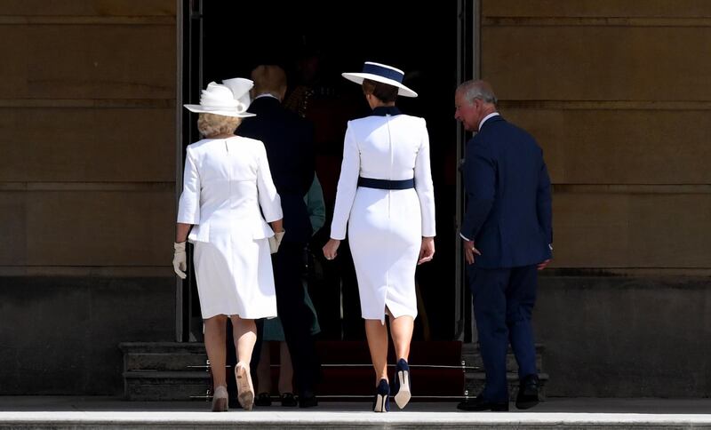 US First Lady Melania (C) with Britain's Prince Charles The Prince of Wales (R) and Camilla the Duchess of Cornwall (L) during the Ceremonial Welcome at Buckingham Palace, in London.  EPA