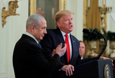 FILE PHOTO: U.S. President Donald Trump and Israel's Prime Minister Benjamin Netanyahu hold a joint news conference to discuss a new Middle East peace plan proposal in the East Room of the White House in Washington, U.S., January 28, 2020. REUTERS/Brendan McDermid/File Photo