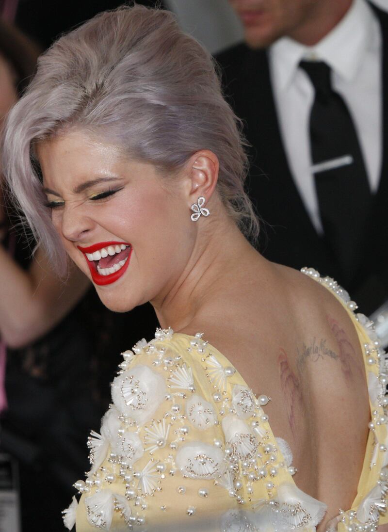 Kelly Osbourne arrives at the 20th Annual Elton John AIDS Foundation Academy Awards Viewing Party, for the 84th Annual Academy Awards, in the City of West Hollywood Park on February 26, 2012 in West Hollywood, California. AFP PHOTO/PATRICK T. FALLON
