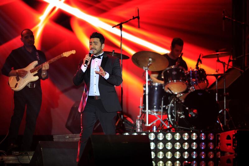 Egyptian pop sensation Tamer Hosny performs on stage in the western Saudi city of Jeddah. Amer Hilabi / AFP