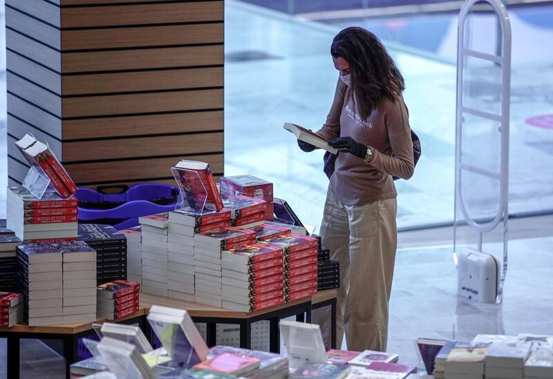 Abu Dhabi, United Arab Emirates, May 10, 2020.  
Book lovers at the newly opened Kinokuniya book shop at the Galleria Mall, Al Maryah Island, Abu Dhabi.
Victor Besa/The National
Section:  NA
Reporter: