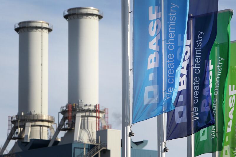(FILES) This file photo taken on February 24, 2017 shows flags with the logo of German chemicals company BASF as they flutter near the company's headquarters in Ludwigshafen, western Germany.
German chemicals and pharmaceuticals giant Bayer announced a multi-billion-euro deal Friday, October 13, 2017, to sell parts of its agrichemical business to rival BASF, easing the path of its planned takeover of US seed maker Monsanto. / AFP PHOTO / Daniel ROLAND
