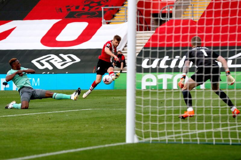 Southampton's Stuart Armstrong, centre,  has a shot on goal. PA