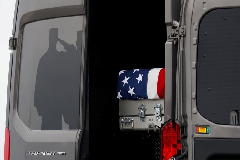 FILE PHOTO:    The casket carrying the remains of Scott Wirtz, a civilian employee of the U.S. Defense Intelligence Agency killed along with three members of the U.S. military during a recent attack in Syria, sits in a military vehicle during a dignified transfer ceremony as they are returned to the United States at Dover Air Force Base, in Dover, Delaware, U.S., January 19, 2019. REUTERS/Kevin Lamarque/File Photo