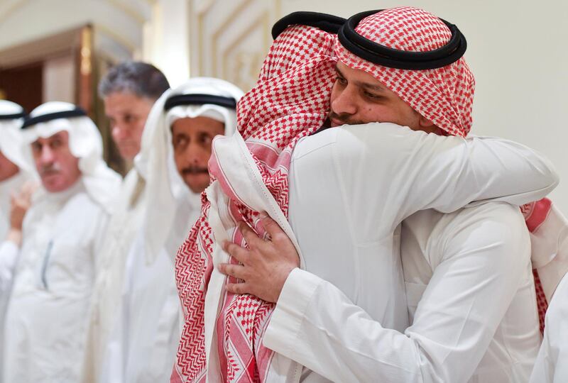 Salah Khashoggi, son of Saudi journalist Jamal Khashoggi, receives a mourner offering condolences in Jeddah, Saudi Arabia. Reuters