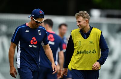 England's Alastair Cook, left, with Joe Root.