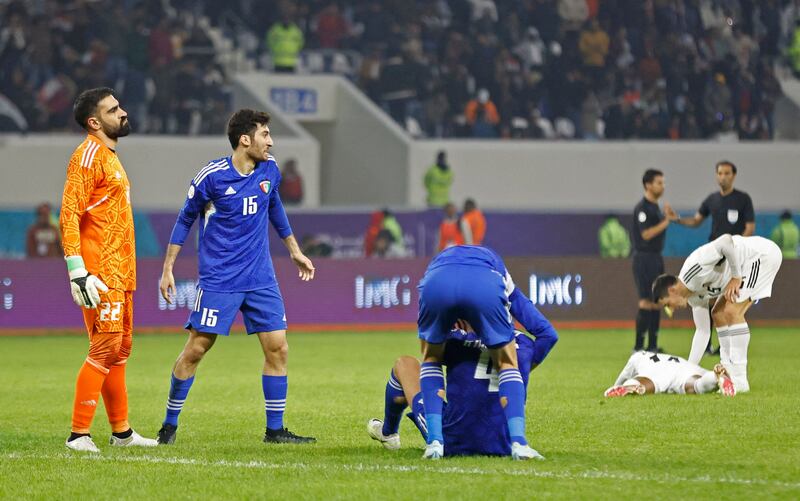 Kuwait's Khaled Hajiah celebrates with Hamad Al Qallaf and teammates after the match. Reuters