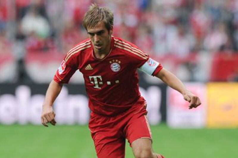 Bayern Munich's midfielder Philipp Lahm plays the ball during the German first division Bundesliga football match FC Bayern Munich vs Borussia Moenchengladbach in the southern German city of Munich on August 7, 2011.  AFP PHOTO / CHRISTOF STACHE