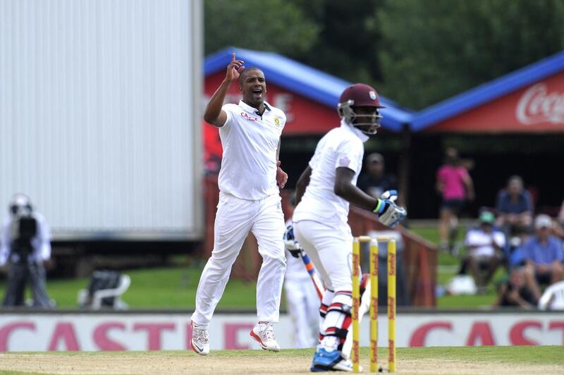 South African paceman Vernon Philander, centre, celebrates after taking the wicket of West Indies batsman Jermaine Blackwodd in the first Test at Centurion. Gianluigi Guercia / AFP