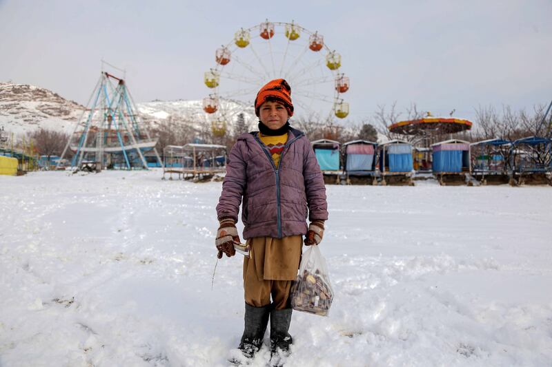 A snow-covered amusement park in Kabul. EPA

