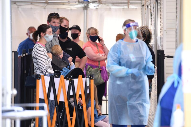 People wait to be tested at the Goulburn Valley Health-Mcintosh Covid-19 testing centre in Shepparton, Victoria, Australia. The  Covid-19 outbreak in Shepparton has been caused by a lorry driver infected in a shopping centre earlier in October.  EPA