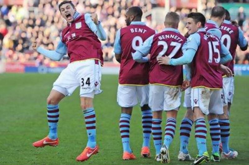 Matthew Lowton of Aston Villa celebrates scoring his team's second goal in a 3-1 win against Stoke City. Chris Brunskill / Getty Images