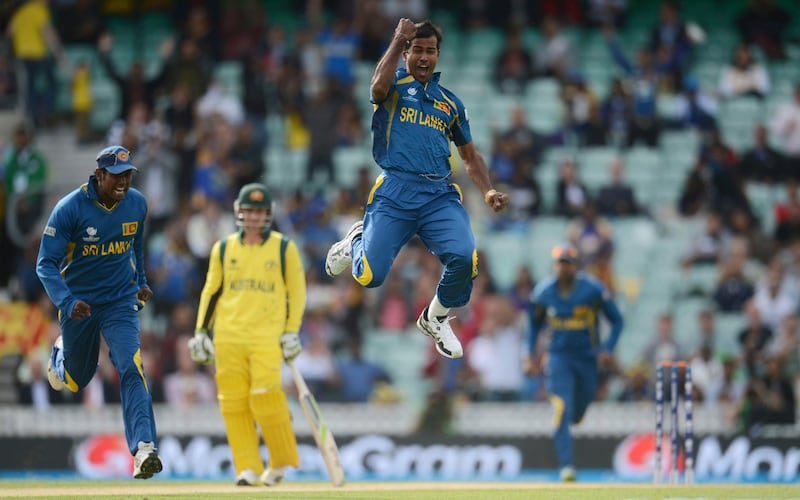 Sri Lanka's Nuwan Kulasekara leaps in celebration after dismissing Australia's Shane Watson (not in picture) during the ICC Champions Trophy group A match at The Oval cricket ground, London June 17, 2013. REUTERS/Philip Brown (BRITAIN - Tags: SPORT CRICKET TPX IMAGES OF THE DAY) *** Local Caption ***  PB15_CRICKET-CHAMPI_0617_11.JPG