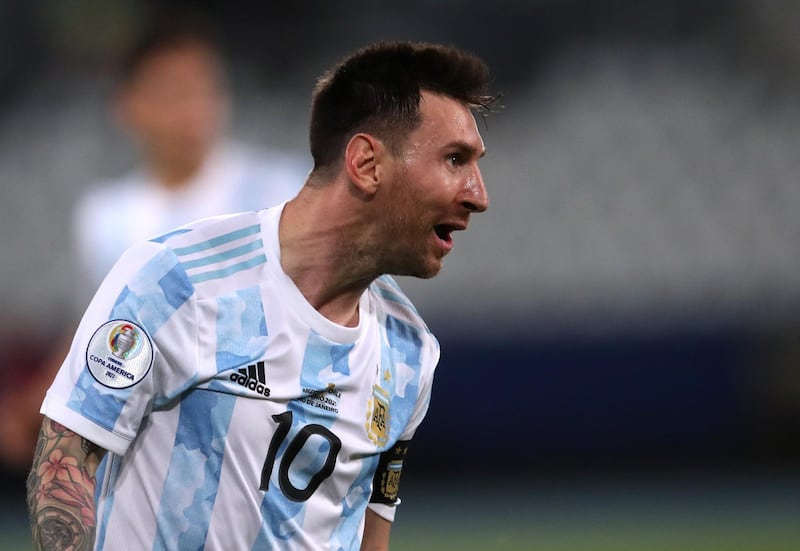Argentina's Lionel Messi celebrates scoring their first goal against Chile at the Estadio Nilton Santos, Rio de Janeiro. Reuters