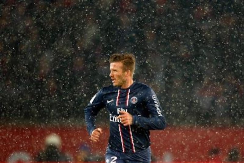 Paris Saint-Germain's David Beckham runs during their French Ligue 1 match against Olympic Marseille at Parc des Princes stadium in Paris. Charles Platiau  / Reuters