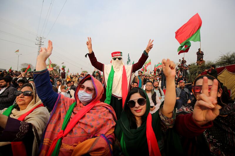 Supporters of former Prime Minister Imran Khan's Pakistan Tehrik-e-Insaf (PTI) party protest against alleged rigging in the country's general elections, which were held on February 8. EPA