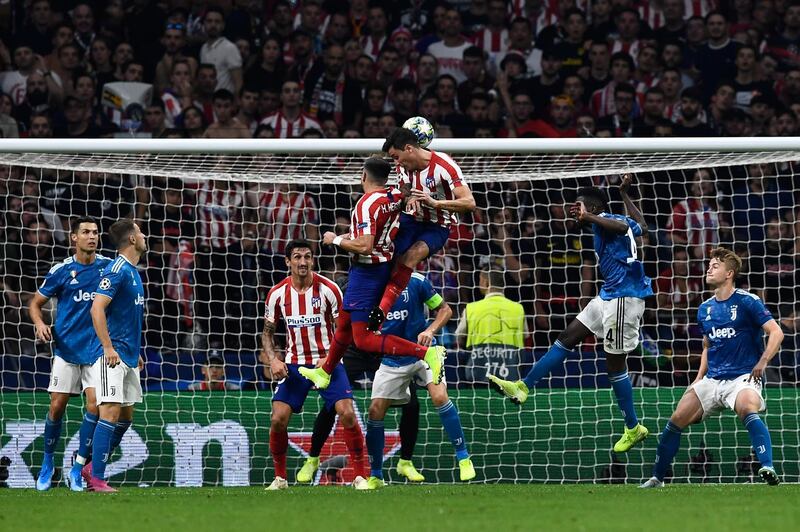 Atletico Madrid's Mexican midfielder Hector Herrera scores a goal. AFP