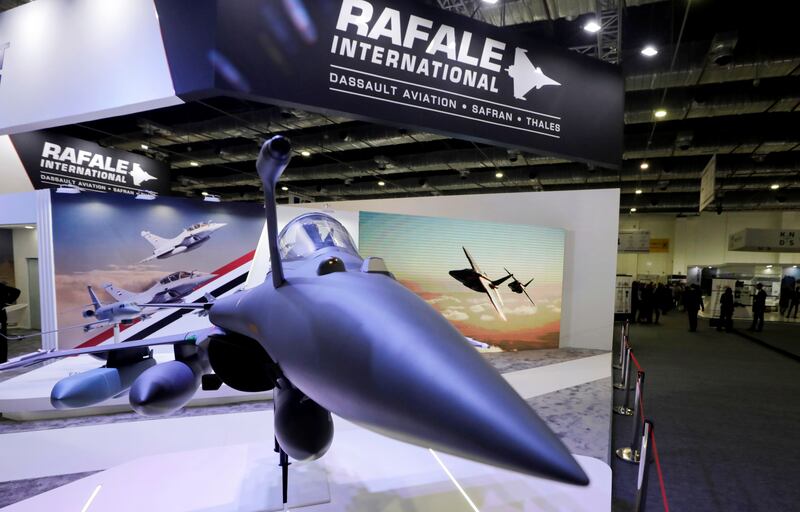 A model of a Rafale plane is displayed at the French stand. Reuters