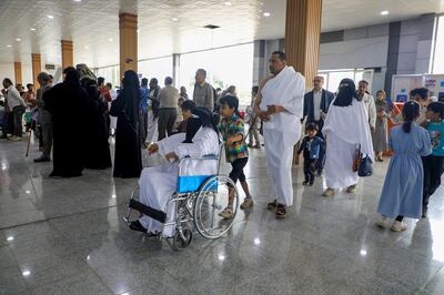 Yemeni Muslims wait at Sanaa International Airport to board a flight to Makkah. AFP