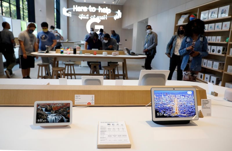 Shoppers are seen inside the Google retail store. EPA