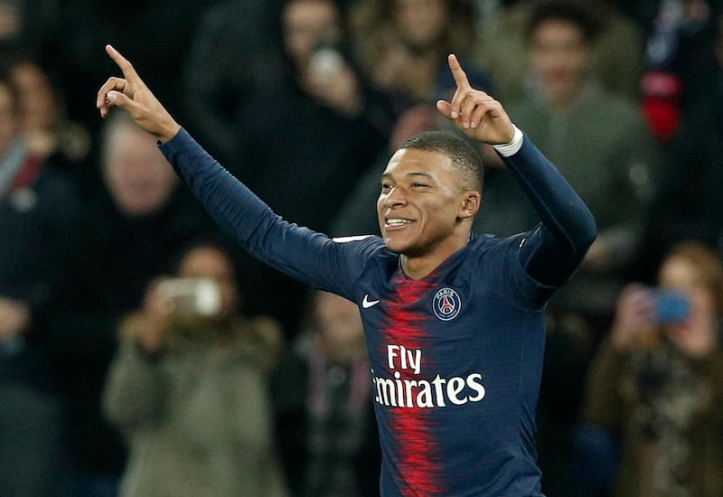 epa07384173 Paris Saint Germain's Kylian Mbappe celebrates after scoring the 5-1 lead during the French Ligue 1 soccer match between PSG and Montpellier at the Parc des Princes stadium in Paris, France, 20 February 2019.  EPA/YOAN VALAT