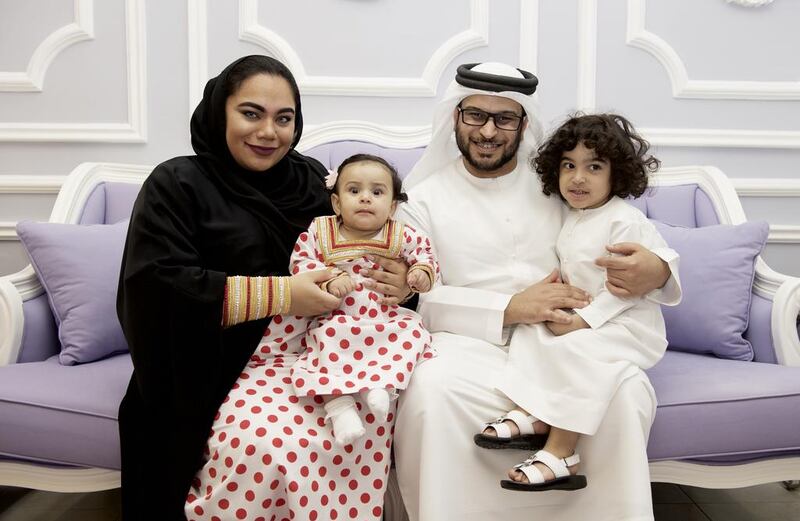 Abdulrahman Al Shamsi, who will be enlisted for national service in January, with his wife Fatima, daughter Maria and son Saeed. Vidhyaa for The National