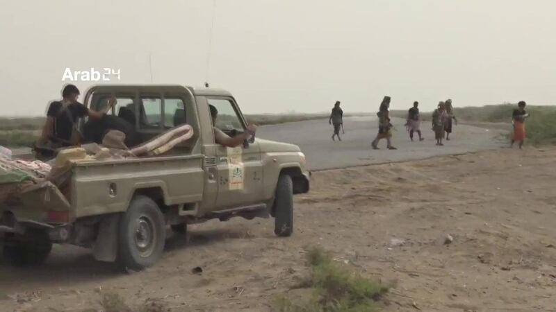 Members of Arab-backed Yemeni forces are driving a truck near the airport on the outskirts of Hodeidah, Yemen, on June 20, 2018 in this still image taken from video. All photos ARAB 24 via Reuters