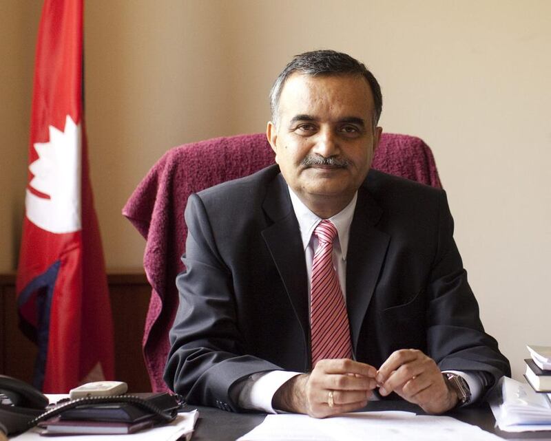 Ambassador Dhananjay Jha says thousands of Nepalis will not be able to replace their old passports before the deadline. Lee Hoagland / The National