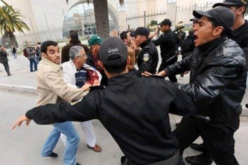 Police fired tear gas to help disperse a rally on a central avenue in Tunis - an area where demonstrations have been banned.