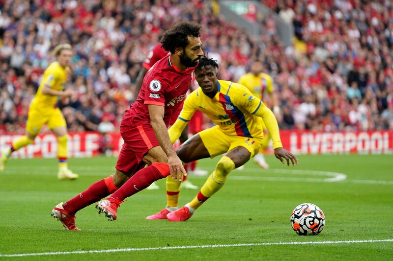 Liverpool forward Mohamed Salah runs with the ball. AP