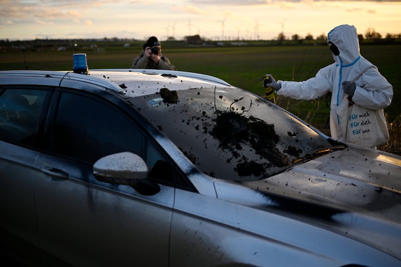A police car that was targeted by activists. Getty