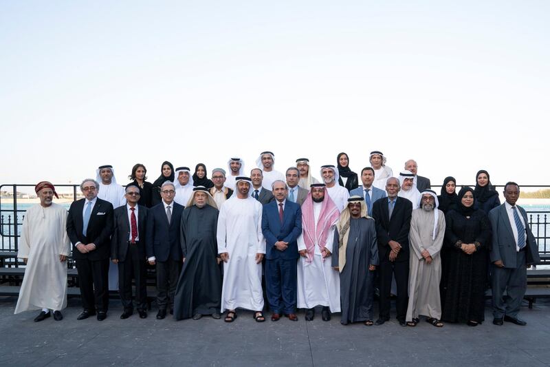 ABU DHABI, UNITED ARAB EMIRATES - January 21, 2019: HH Sheikh Mohamed bin Zayed Al Nahyan, Crown Prince of Abu Dhabi and Deputy Supreme Commander of the UAE Armed Forces (1st row 8th R), stands for a photograph with members of Emirates Writers Union, during a Sea Palace barza. 

( Mohamed Al Hammadi / Ministry of Presidential Affairs )
---