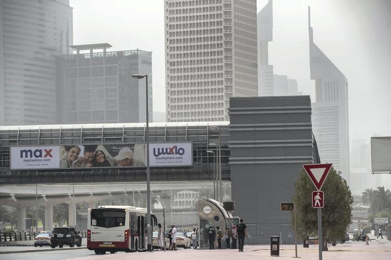 DUBAI, UNITED ARAB EMIRATES. 12 MARCH 2021. Dusty weather with wind in Dubai limits visability. (Photo: Antonie Robertson/The National) Journalist: None. Section: National.