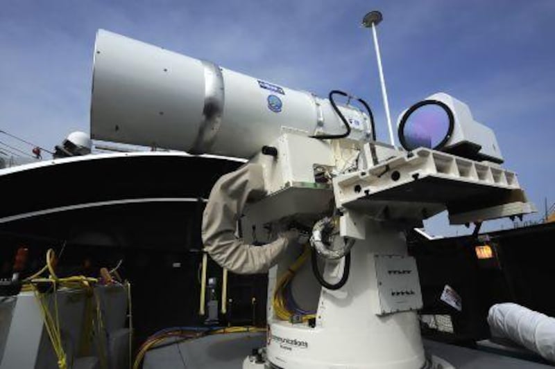 The Laser Weapon System (LaWS) temporarily installed aboard the guided-missile destroyer USS Dewey (DDG 105) in San Diego, California.