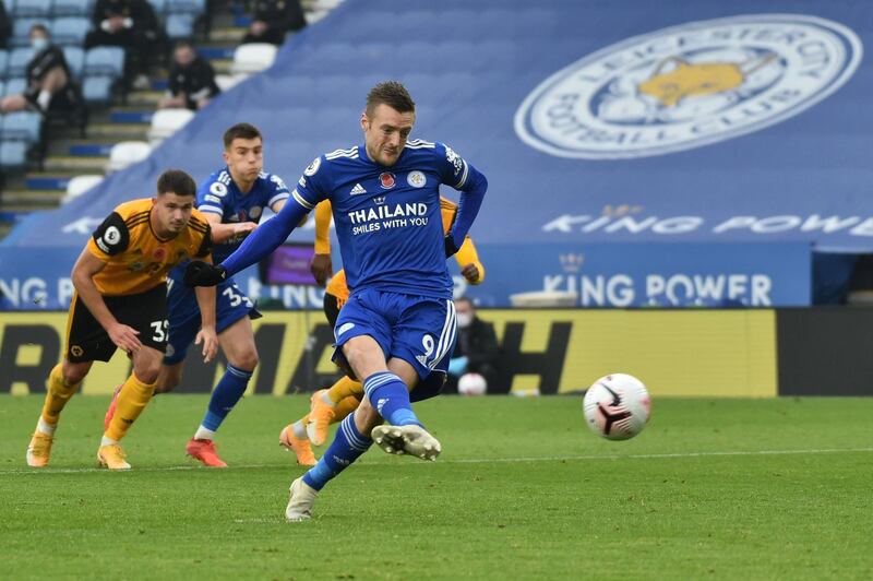 Leicester City's English striker Jamie Vardy scores the opening goal from the penalty spot during the English Premier League football match between Leicester City and Wolverhampton Wanderers at King Power Stadium in Leicester, central England on November 8, 2020. RESTRICTED TO EDITORIAL USE. No use with unauthorized audio, video, data, fixture lists, club/league logos or 'live' services. Online in-match use limited to 120 images. An additional 40 images may be used in extra time. No video emulation. Social media in-match use limited to 120 images. An additional 40 images may be used in extra time. No use in betting publications, games or single club/league/player publications.
 / AFP / POOL /  Rui Vieira                          / RESTRICTED TO EDITORIAL USE. No use with unauthorized audio, video, data, fixture lists, club/league logos or 'live' services. Online in-match use limited to 120 images. An additional 40 images may be used in extra time. No video emulation. Social media in-match use limited to 120 images. An additional 40 images may be used in extra time. No use in betting publications, games or single club/league/player publications.
