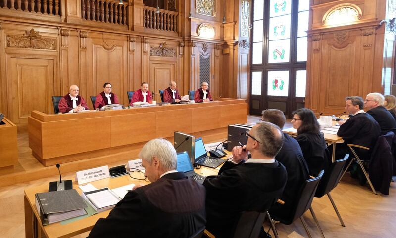 Judges and lawyers sit at the beginning of the hearing in a hall of the Federal Administrative Court on February 22, 2018 in Leipzig, eastern Germany, where the court possibly will deliver a verdict on the legality of banning driving diesel cars when pollution reaches high levels.
Since Volkswagen admitted in 2015 to installing software to fool regulatory emissions tests in millions of cars worldwide -- the so-called "dieselgate" scandal --  nitrogen oxide (NOx) and fine particle emissions from diesel motors have been the top priority for German environmentalists. / AFP PHOTO / dpa / Sebastian Willnow / Germany OUT