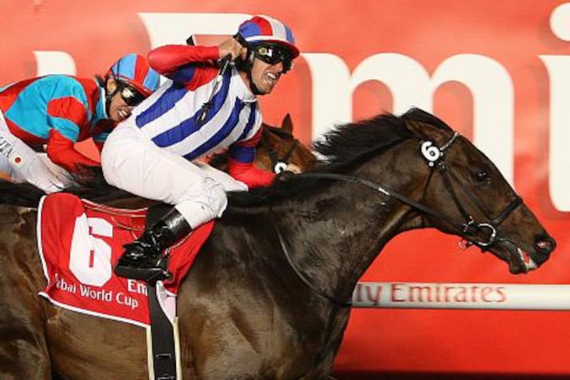 DUBAI, UNITED ARAB EMIRATES, Mar 26 : Victoire Pisa (JPN) (no 6) ridden by Mirco Demuro won the Dubai World Cup worlds richest horse race at Meydan Racecourse in Dubai. (Pawan Singh / The National) For Sports.