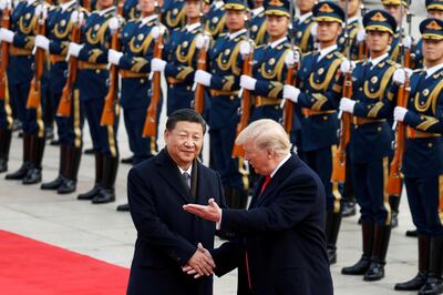 FILE PHOTO: U.S. President Donald Trump takes part in a welcoming ceremony with China's President Xi Jinping in Beijing, China, November 9, 2017. To match Special Report HUAWEI-USA/CAMPAIGN REUTERS/Damir Sagolj/File Photo