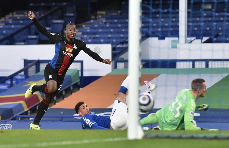 Crystal Palace's Michy Batshuayi scores his side's opening goal during the English Premier League soccer match between Everton and Crystal Palace at Goodison Park in Liverpool, England, Monday, April 5, 2021.(Peter Powell/Pool via AP)