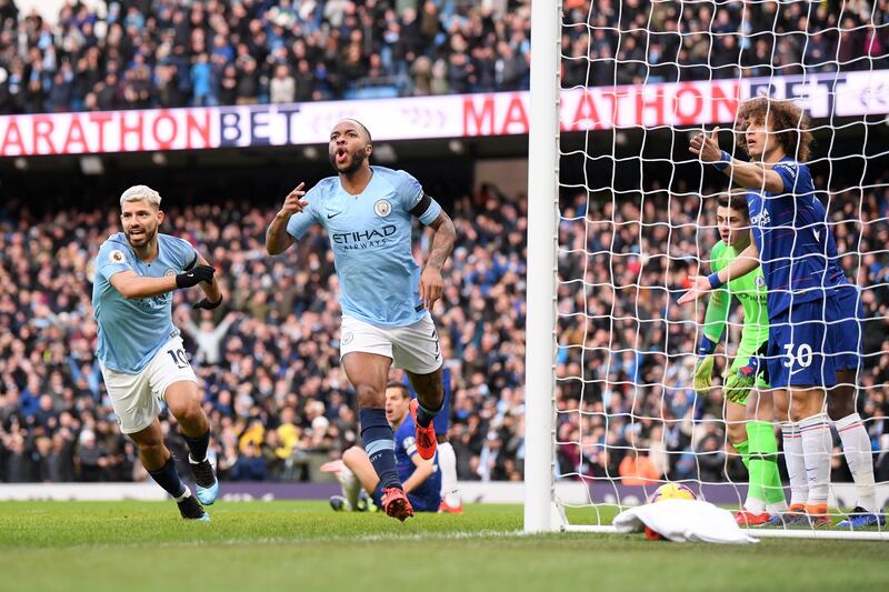 Raheem Sterling, centre, opened the scoring for City. Getty.