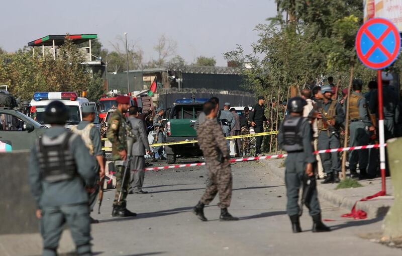 Afghan security police inspect at the site of suicide attack near the Afghan defence ministry in Kabul, Afghanistan on September 5, 2016, where twin bombings killed dozens of people in an attack claimed by the Taliban. Rahmat Gul/AP Photo