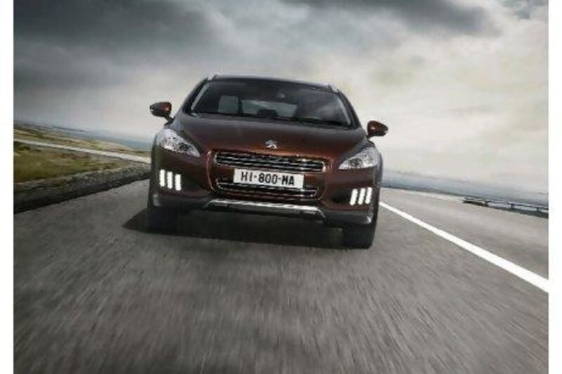 The 508 RXH features claw-like vertical LED lights. Courtesy of Peugeot