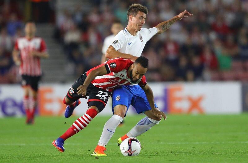 Nathan Redmond of Southampton is challenged by Lukas Marecek of Sparta Praha during their Europa League match. Warren Little / Getty Images