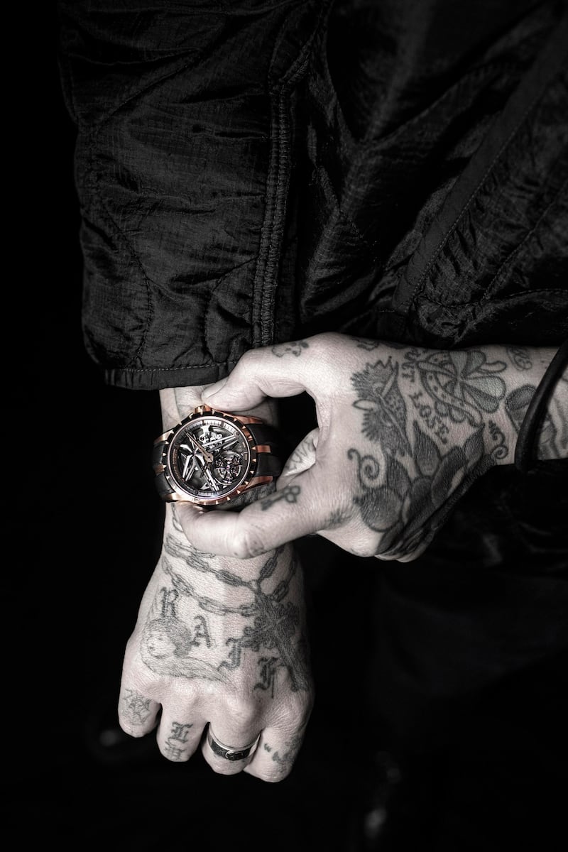 Roger Dubuis has partnered with Los Angeles tattoo artist, Dr. Woo, under the concept, “Urban Art Tribe.” The long-term partnership that will begin with the artist sharing his creative process by opening their workshops to clients of the brand. 
Courtesy Roger Dubuis
