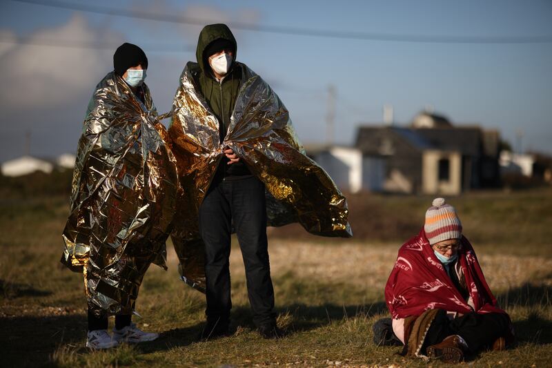 Migrants arrive at Dungeness after being intercepted in the English Channel by the UK Border Force this month. Getty