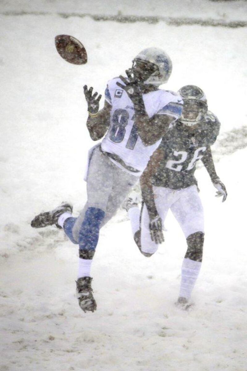 Detroit wide receiver Calvin Johnson makes a catch in Philadelphia. Matt Rourke / AP